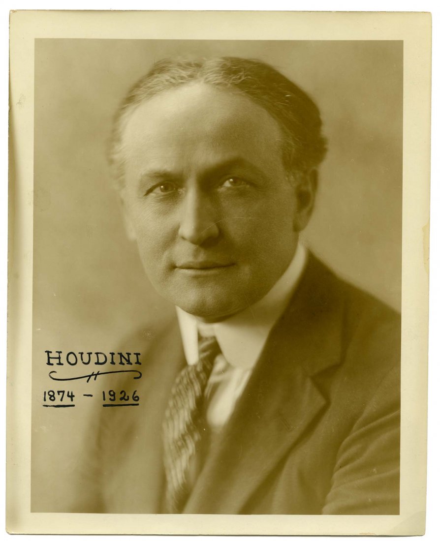 Houdini, Harry. Sepia Tone Vintage Portrait of Houdini.: Houdini, Harry. Sepia Tone Vintage Portrait of Houdini. Circa 1924. Formal studio photo of Harry Houdini in suit and tie. Early print with prior owner’s inked-in notations identifying Houdini and hi