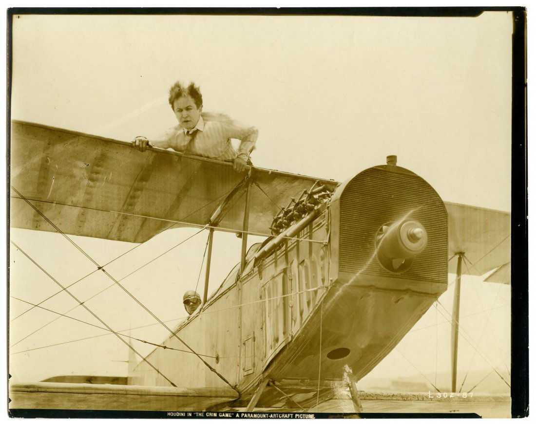 Houdini, Harry. Houdini Holding on to Airplane Wing in (1 of 1)