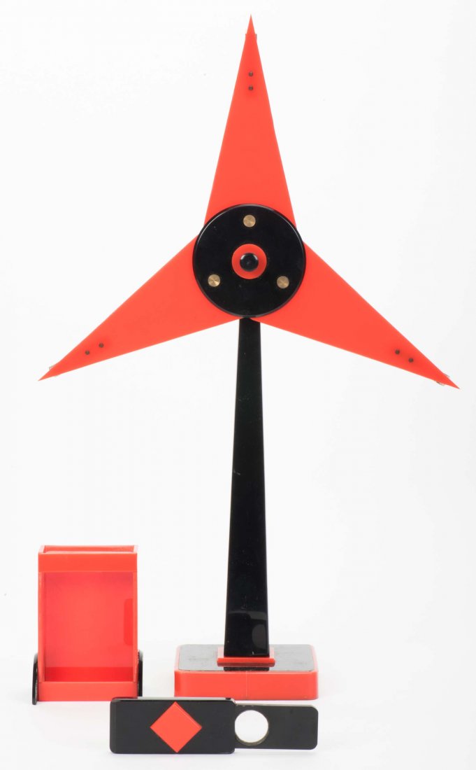 Star Selection. Scotland: Norman Stout for Silray: Star Selection. Scotland: Norman Stout for Silray Magic, ca. 1952. Red and black Lucite star (11 x 18”) and houlette (3 x 4”). The chosen card is the only one remaining on the star, after being wi