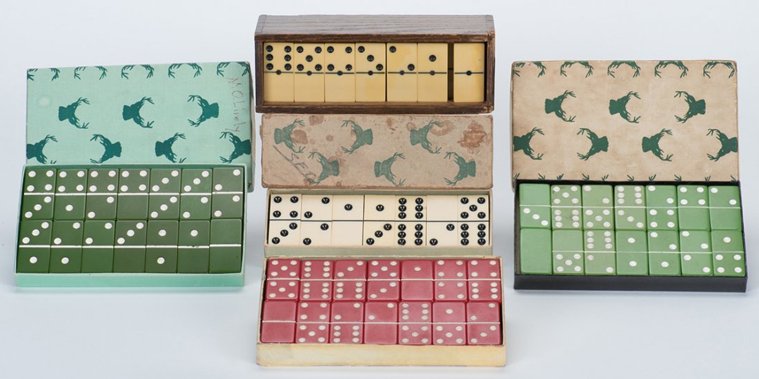 Five Sets of Bakelite Dominoes in Original Boxes.: Five Sets of Bakelite Dominoes in Original Boxes. Providence, R.I.: Elkloid, ca. 1940. Comprising two sets in green, one set in red and two sets in white.
