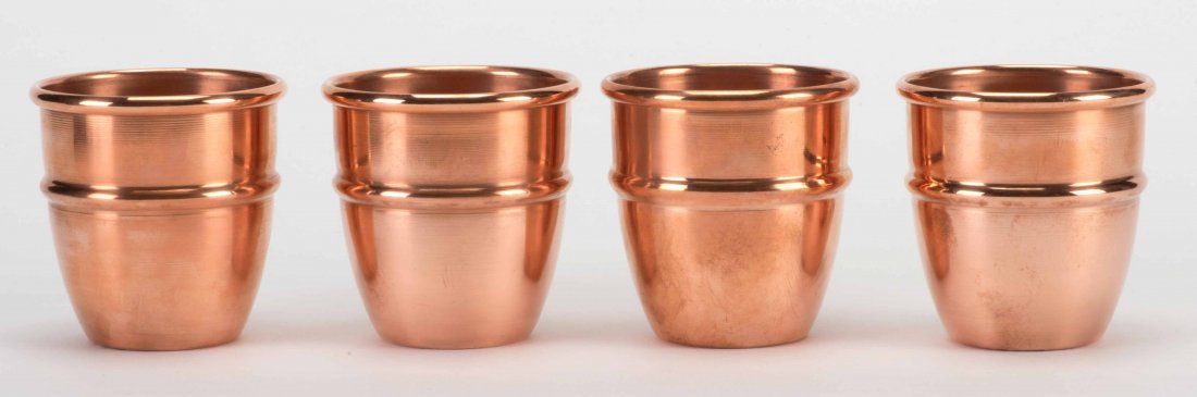Goblets Duvivier. Paris: Mayette, 1998. Set of four: Goblets Duvivier. Paris: Mayette, 1998. Set of four spun copper cups and cloth-covered balls for the Cups and Balls routine developed by Dominique Duvivier in which a fourth cup appears on the magicia