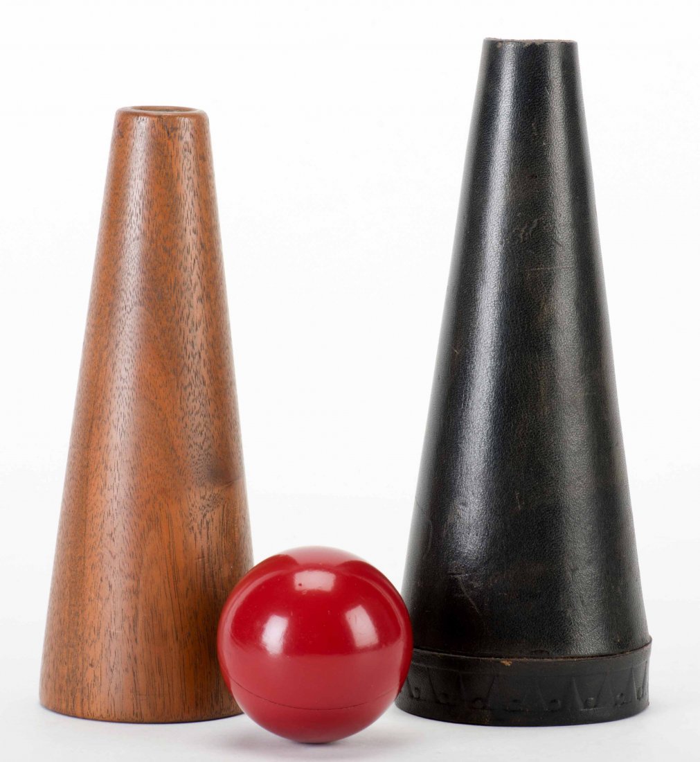 McKinven, John. Ball and Cone. Lake Forest, Ill., ca.: McKinven, John. Ball and Cone. Lake Forest, Ill., ca. 1990. Seamless leather cone with turned hardwood insert, used for the sleight-of-hand trick popularized by Dai Vernon in his Harlequin Act. 7 _ x