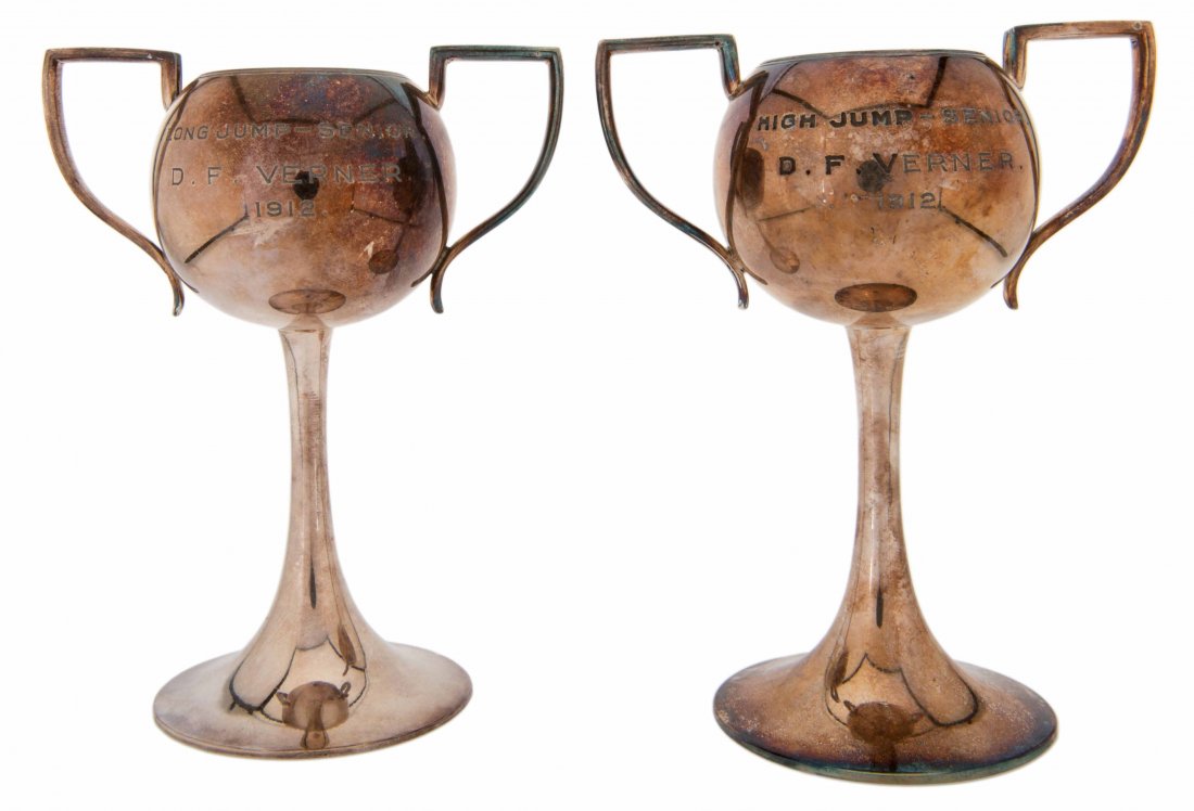Vernon, Dai. Two Dai Vernon Track and Field Trophies.: Vernon, Dai. Two Dai Vernon Track and Field Trophies. Silver plated. Awarded in 1912 by Ashbury College, Ottawa, for High Jump and Long Jump, and engraved with his name D.F. Verner, the name of the ev