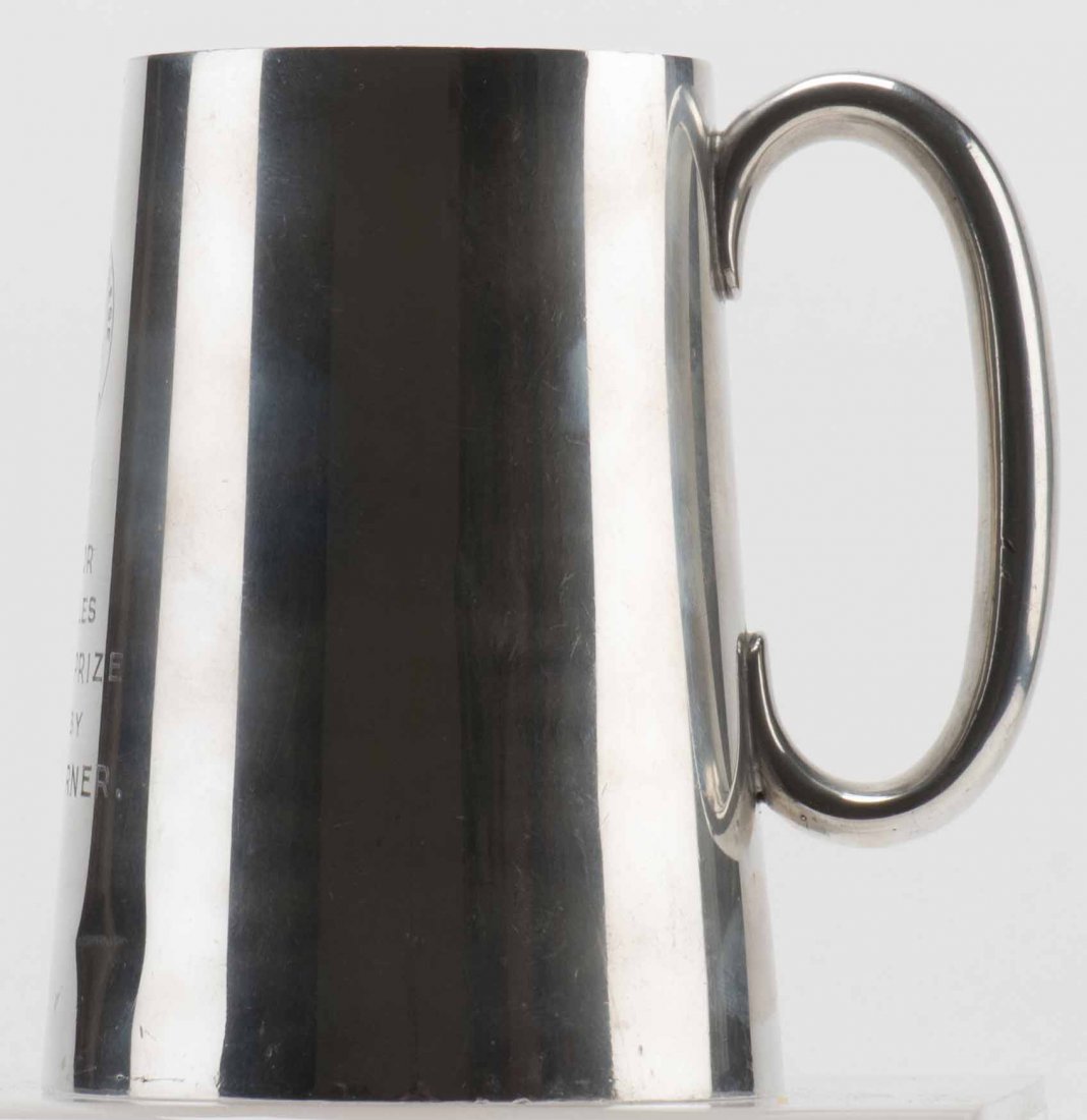 Vernon, Dai. Dai Vernon Senior Hurdle Second Prize: Vernon, Dai. Dai Vernon Senior Hurdle Second Prize silver trophy. Silver tankard awarded to Vernon in 1913 by Ashbury College of Ottawa and engraved with his name D.F. Verner and the coat of arms of t