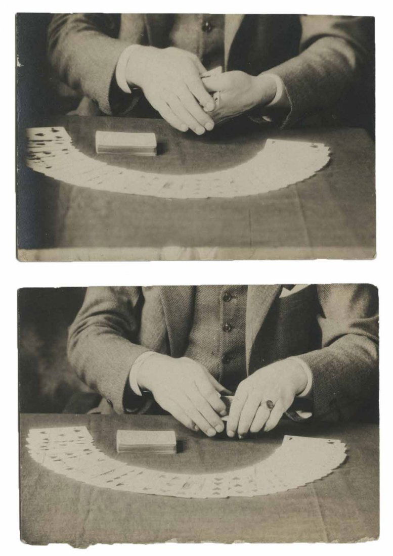 Vernon, Dai. Two Photographs of Dai Vernons Hands.: Vernon, Dai. Two Photographs of Dai Vernons Hands. Circa 1933. Both show Vernon from the neck down, cards spread on the table before him, the mechanics of a shift being executed in his hands. Each 3 3