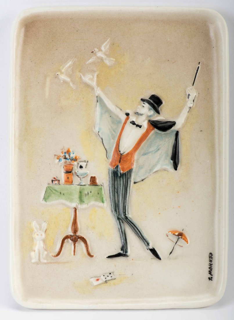 Moretto, Toni. Conjurer Producing Doves. Italy, ca.: Moretto, Toni. Conjurer Producing Doves. Italy, ca. 1995. Tray-like fired clay sculpture (4 _ x 3 _) depicting a magician beside his table filled with apparatus. He releases a trio of doves, grasping
