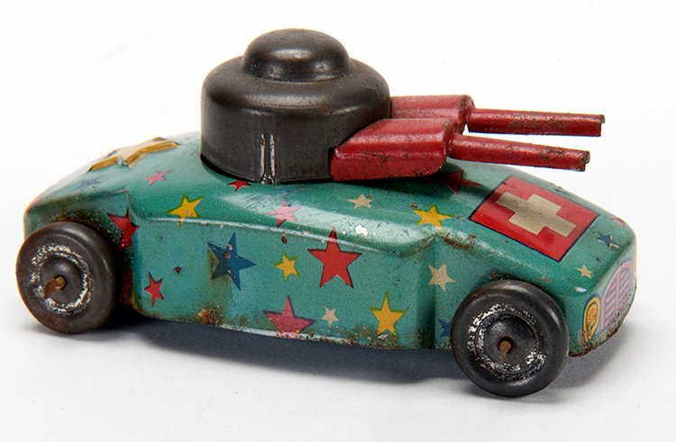 Petite Starred Tank. Possibly Swiss, mid-twentieth: Petite Starred Tank. Possibly Swiss, mid-twentieth century. Tin litho push-along toy with colorful stars and the Swiss flag, tank gun attachment is mobile. 3 long. Some oxidation especially on edges a