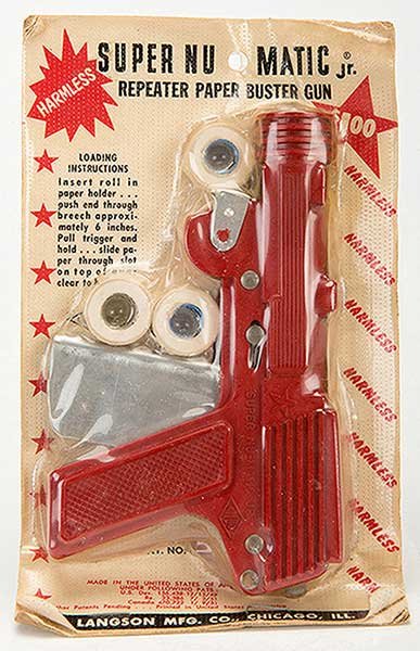 Super Nu-Matic Jr. Repeater Paper Buster Gun. Chicago:: Super Nu-Matic Jr. Repeater Paper Buster Gun. Chicago: Langson Manufacturing Co., ca. 1951. Mint in original packaging. With four original paper rolls, this red toy gun has instructions on packaging a