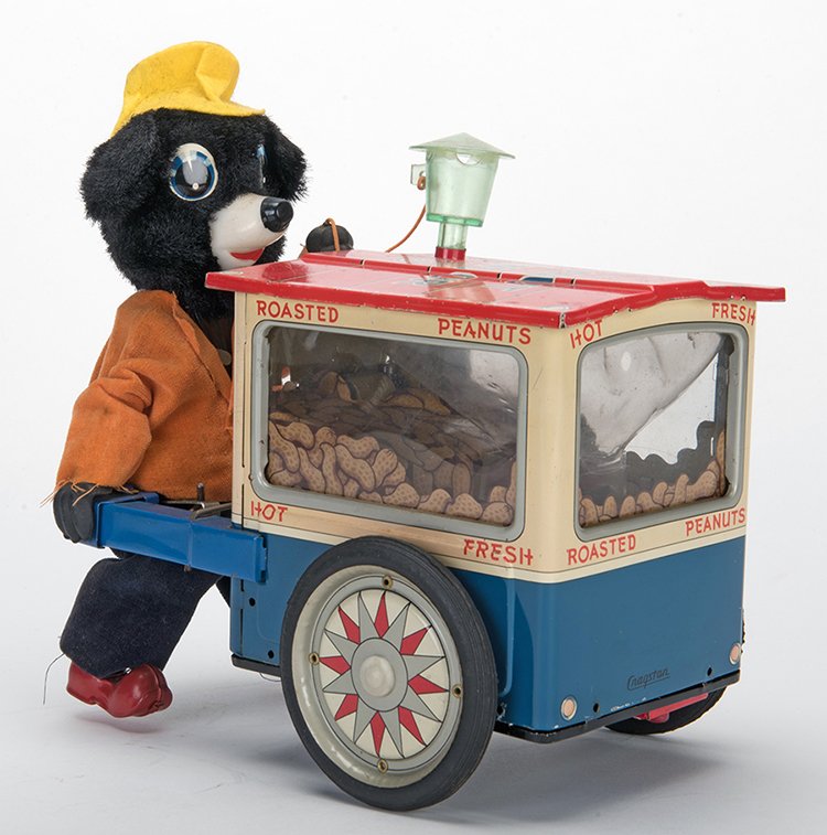 Peanut Vender Bear. New York: Cragstan, mid-twentieth: Peanut Vender Bear. New York: Cragstan, mid-twentieth century. Tin litho toy of a bear pushing a peanut cart. 8 x 5 _ x 9. Not working, otherwise excellent condition.