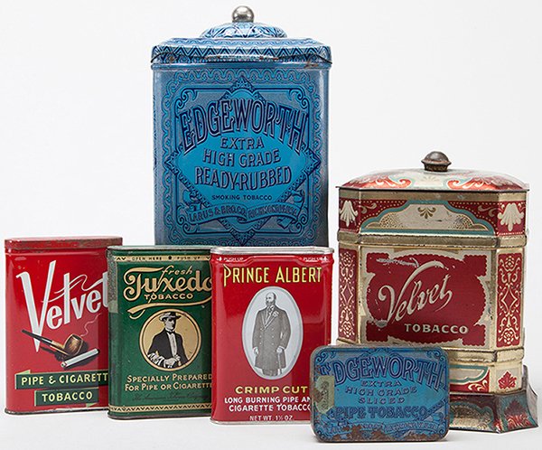 Six Tobacco Tins. Including Velvet canister, Spaulding: Six Tobacco Tins. Including Velvet canister, Spaulding & Merrick, Chicago, with minor paint loss in spots, (6 x 5 _); Velvet pocket tin, Liggett & Meyers, light rust on lid, (4 _ long); Edgeworth cani