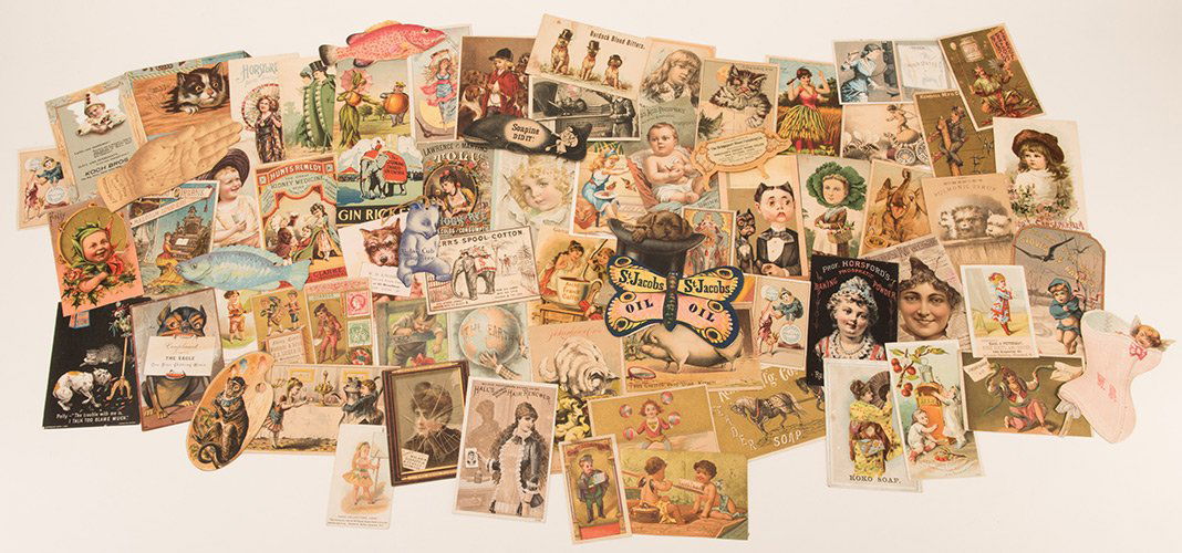 Album of Over 400 Victorian Trade Cards. Including: Album of Over 400 Victorian Trade Cards. Including Medicinal, Pianos and Organs, Stoves and Ranges, Food, Smoking, Sewing, and many more. Pictured are Hires, Mechanical card and hold to light card. Ma