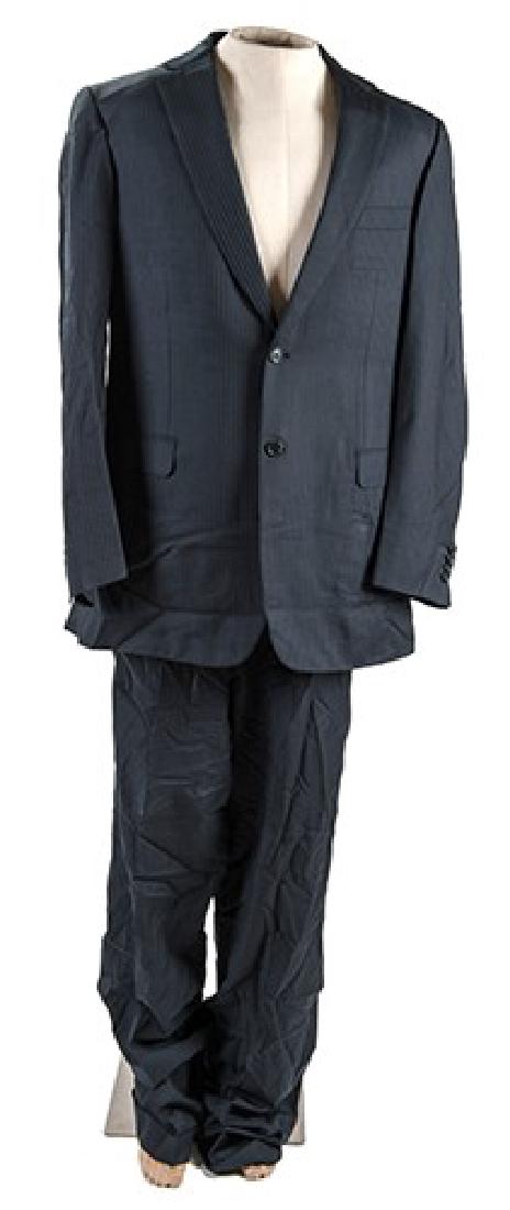 Stellan Skarsgard Screen-Worn Suit in “Angels and: Stellan Skarsgard Screen-Worn Suit in “Angels and Demons.” Brioni, 2009. Comprising a blue suit coat, pants, and pair of Brooks Brothers shoes (in box), all worn by Skarsgard as Commander Richter,