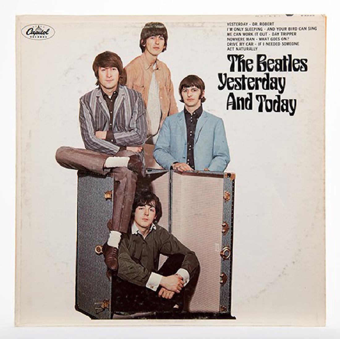 Beatles Yesterday and Today Butcher Cover Second State.: Beatles Yesterday and Today Butcher Cover Second State. Capitol Records, T-2553 (RIAA No. 6), Mono LP, 1966. The black triangle of Ringo’s shirt clearly visible beneath the pasted-over “clean” c