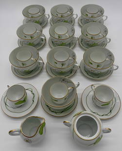 Hermès NIL Waterlilly Porcelain Mixed Tea/Cappuccino Set–12 Saucers, 12 Teacups, 10 Cappuccino: A unique and adaptable Hermès NIL Waterlilly porcelain beverage service, combining multiple matched forms from this rare, discontinued pattern. This mixed-service lot includes:12 saucers (5 1/4 in. d