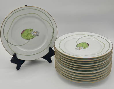 Set of Twelve Hermès NIL Porcelain Waterlilly Dinner Plates- 10.75”: "A complete set of twelve Hermès NIL porcelain dinner plates, each measuring 10 3/4 inches in diameter and approximately 7/8 inch high. These large-format plates feature a vibrant green Waterlilly an