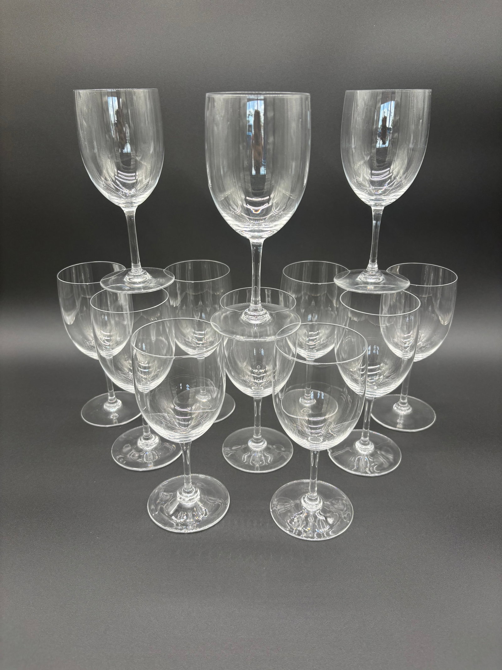 Baccarat Crystal Full Bodied Red Wine Glasses - Lot of 12 (Tall Height) C.1970's: Type: Baccarat Crystal Glasses Quantity: Lot of 9 Dimensions: Length: 7" Width: 3" Depth: 4" Origin: France