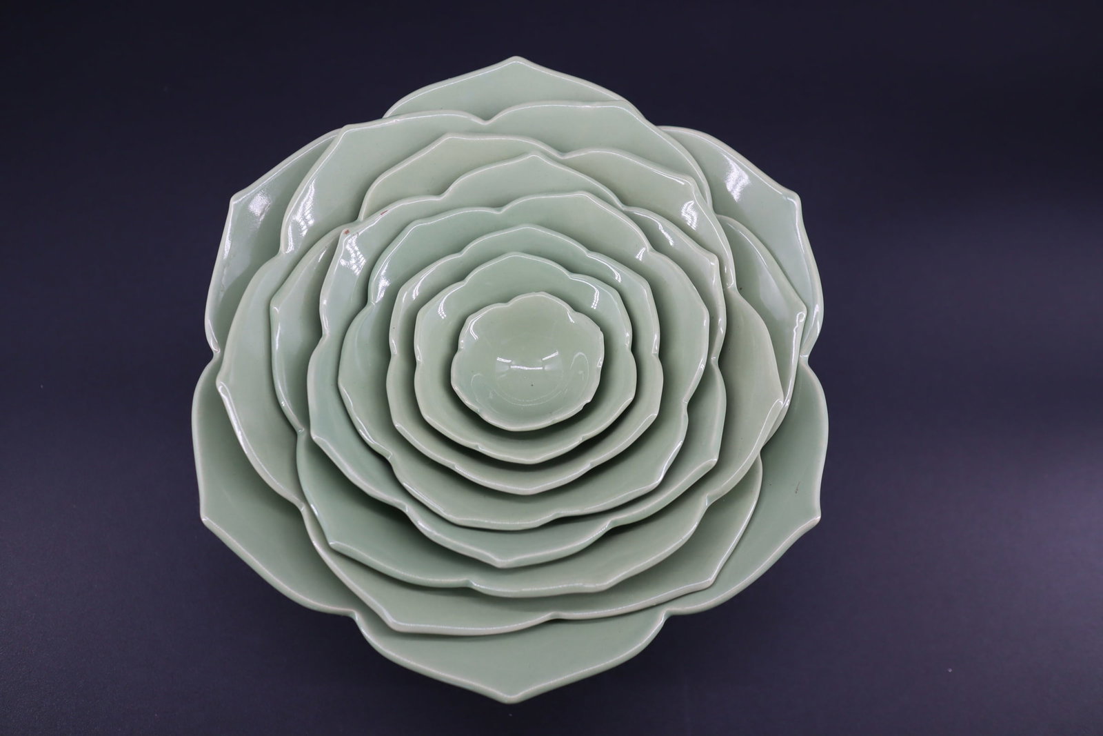 Set of Ten Celadon Green Lotus-Form Nested Bowls – Contemporary Chinese Porcelain: Lot Title: Set of Ten Celadon Green Lotus-Form Nested Bowls – Contemporary Chinese Porcelain Description: A complete set of ten porcelain bowls designed in the form of overlapping lotus petals, grad
