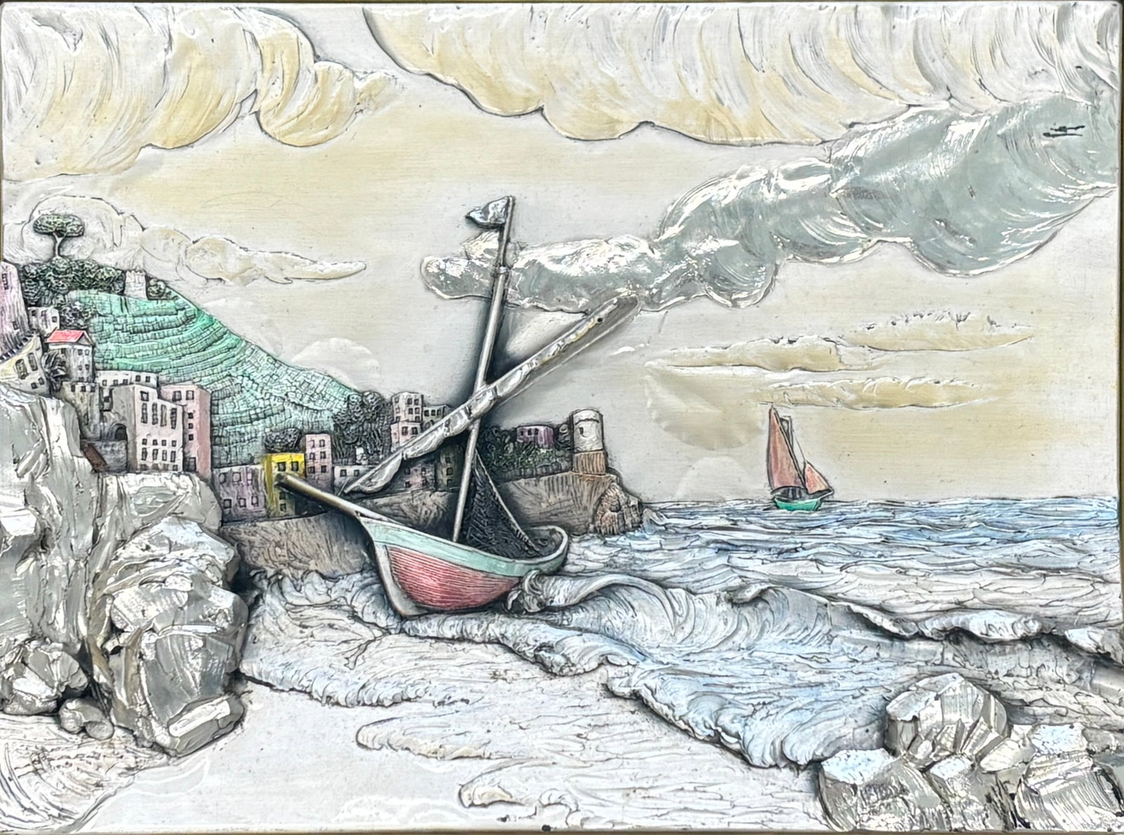 Hand-Chased Sterling Silver 925 Seaside Village, 43–50 Gram Marked: Silver Relief Coastal Scene Unknown Italian Artist Repoussé Silver Panel on Board Frame Dimensions 22 x 26 inches Panel Dimensions 11 x 15 inches A hand-worked repoussé silver coastal tableau execut