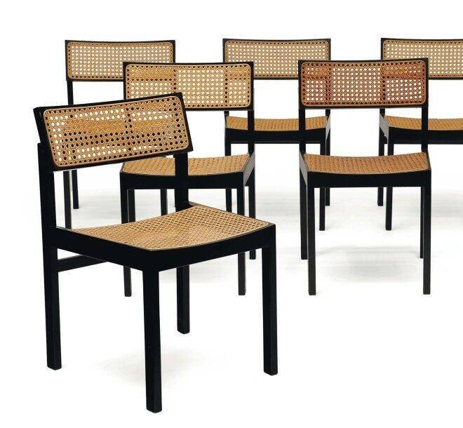 Suite de six chaises modèle "Guhl Chair": Willy GUHL (1915-2004) Assise et dossier en cannage tressé et structure en bois laqué noir Date de création : vers 1959 Dim.: 74 x 48 x 49 cm Localisation : Paris