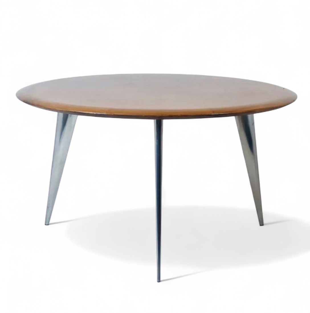 Philippe STARCK M Table: Philippe STARCK MTableWood and aluminumSignedEdition Driade AlephCreation date: 1987H73 D130 cmAn emblematic figure of contemporary design, Philippe Starck was born in Paris in 1949 into a family wher