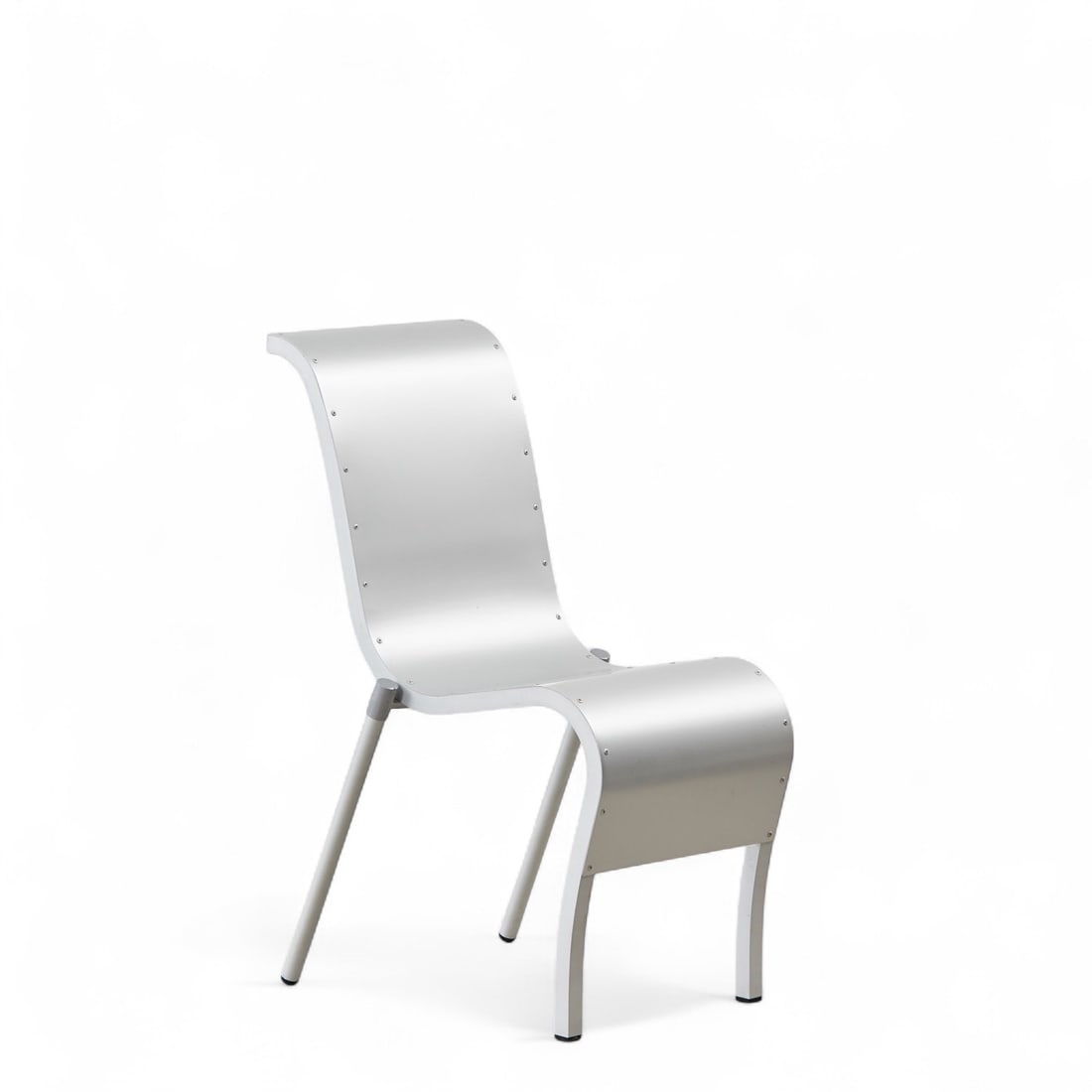 Philippe STARCK (1949) .Romantica .Chaise .: Philippe STARCK (1949) .Romantica .Chaise .Aluminium, assise et dossier composé d'une feuille.Édition Driade.Date de création : 1987.H90 L43 P60 cm..Philippe Starck révèle avec cette chaise "Roma