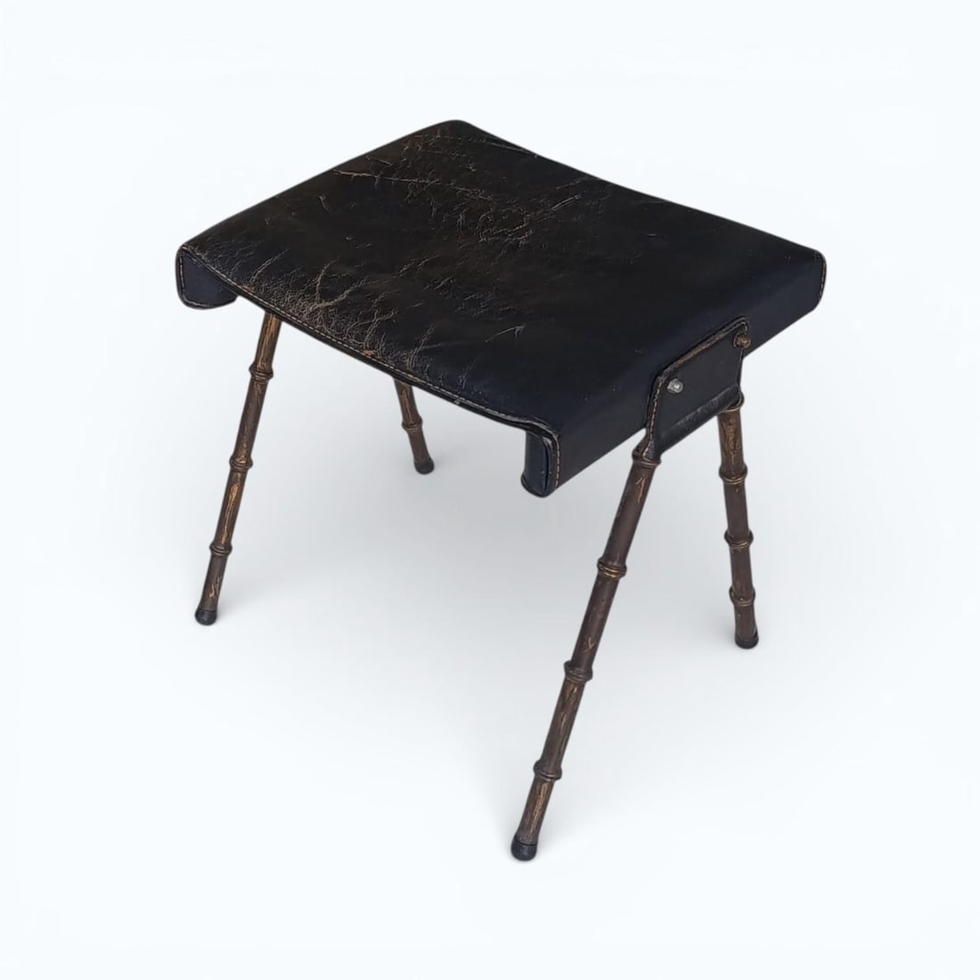 Jacques Adnet (1900–1984).Tabouret.Métal patiné, cuir gainé, rivets métalliques.Date de (1 of 1)