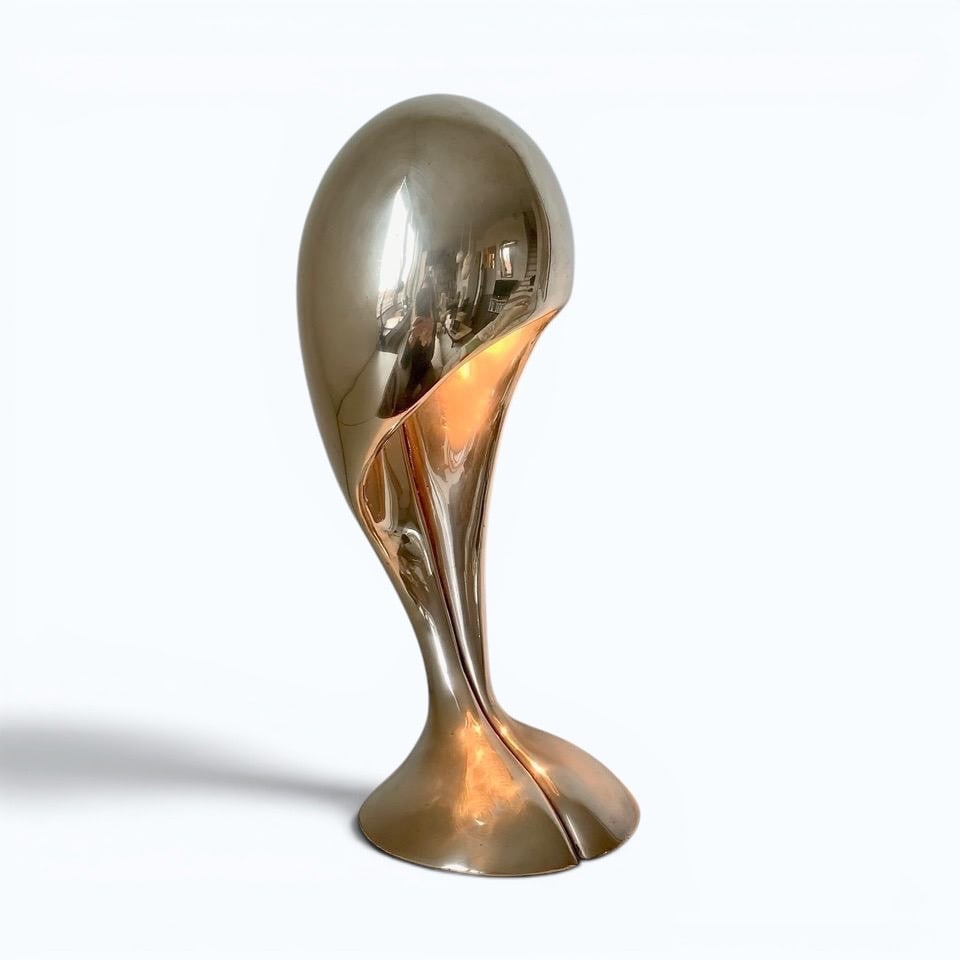 Attributed to Michel Armand Sculptural lamp Polished bronze Date of creation: circa 1970 H35 cm: Attributed to Michel Armand Sculptural lamp Polished bronze Date of creation: circa 1970 H35 cmThis sculptural lamp exemplifies the formal experiments conducted in the 1970s exploring the fusion of