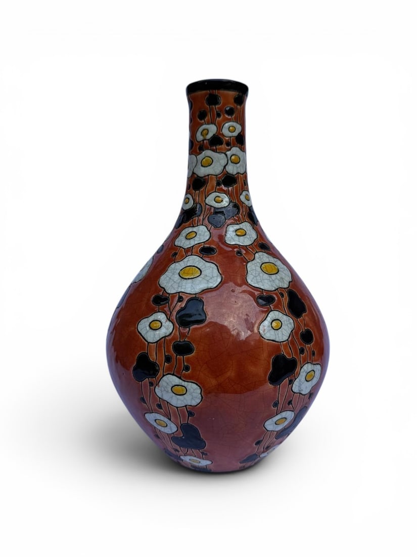 Charles Catteau (1880-1996) Pansu ovoid vase Glazed ceramic with four-color flower design: Charles Catteau (1880-1996)Pansu ovoid vase Glazed ceramic with four-color flower designManufacture Boch Fr?res Keramis Stamped under the base Creation date: circa 1920H28cm Provenance: Charles
