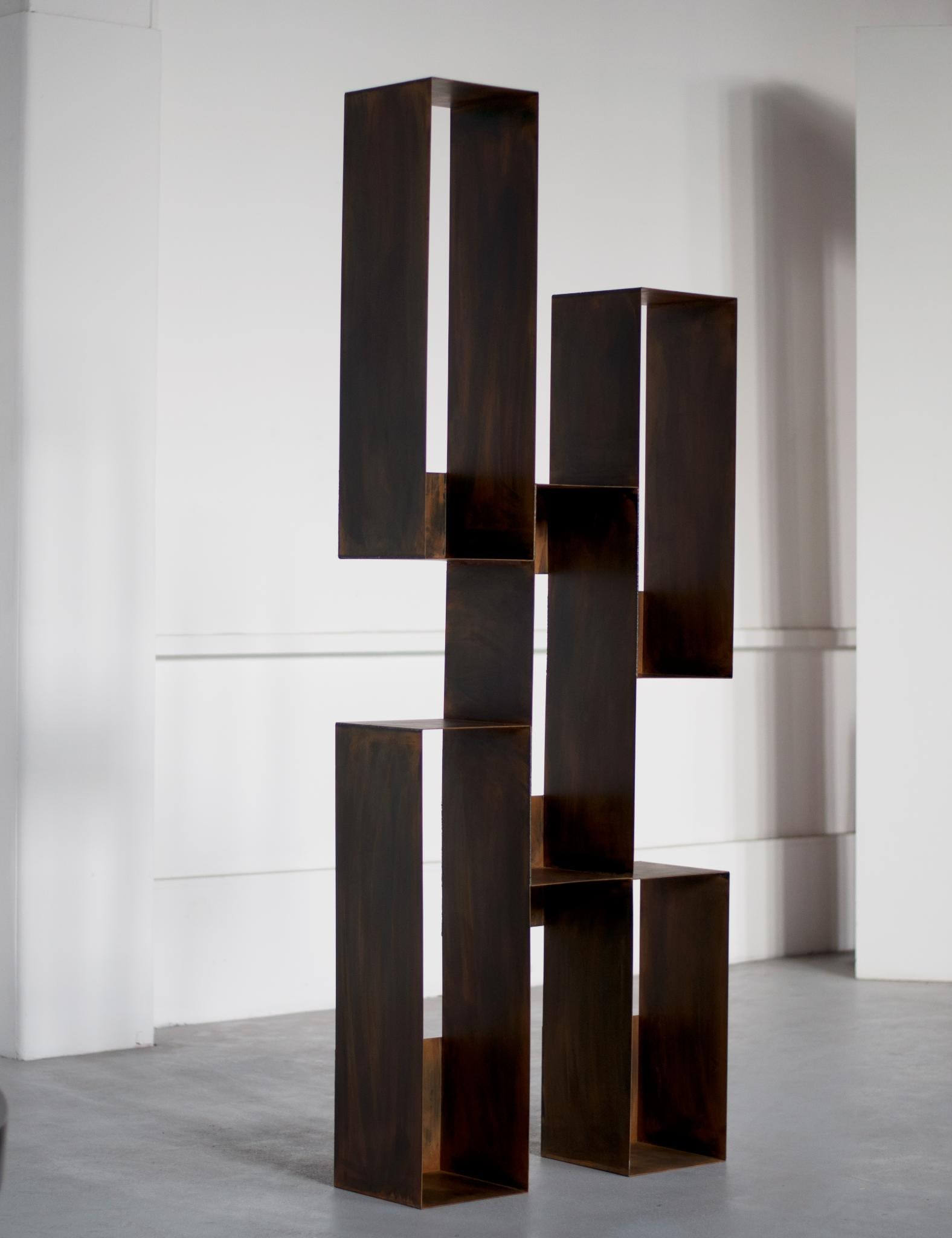 Pol Quadens (b. 1960) Stairway to Heaven Bookcase Chocolate-black patinated steel Limited edition: Pol Quadens (b. 1960)Stairway to Heaven Bookcase Chocolate-black patinated steel Limited edition of 8 pieces Signed H200 W125 D25 cmSelf-taught, Pol Quadens single-handedly embodies the uniqueness of