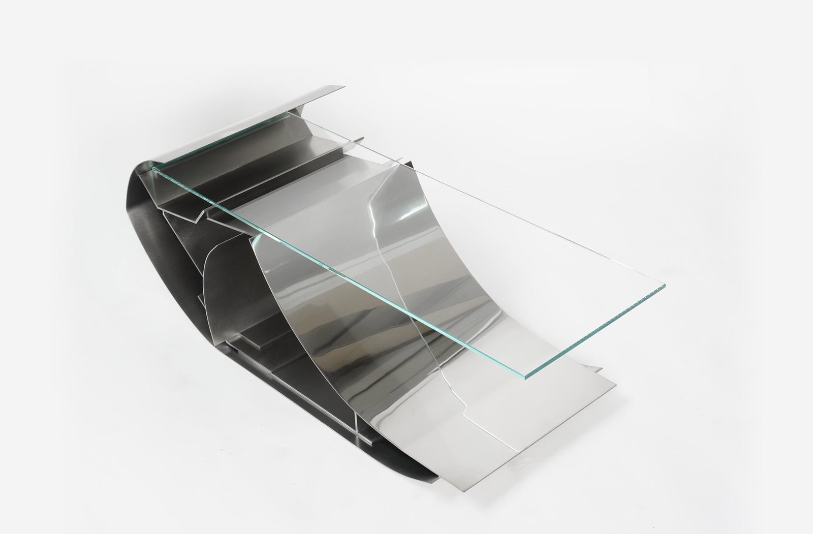 Todomuta Re-BUILT Side table Steel and glass Limited edition of 5 pieces + 1 artist's proof: Todomuta Re-BUILT Side table Steel and glass Limited edition of 5 pieces + 1 artist's proof H46.2 W107 D35.2 cm 52 kgThe Todomuta studio was founded in 2011 under the artistic direction of Laura