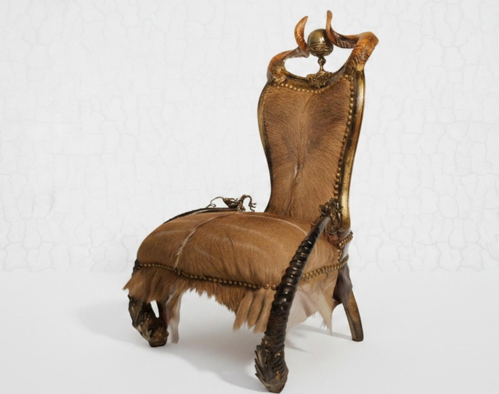 Michel Haillard (1959) Petit poilu Armchair Nyala, hippotragus horns, ram, buffalo bell H110 W100: Michel Haillard (1959)Petit poiluArmchairNyala, hippotragus horns, ram, buffalo bellH110 W100 D90 cmThere is something in Michel Haillard?s work that evokes a cabinet of curiosities, a shaman, and a