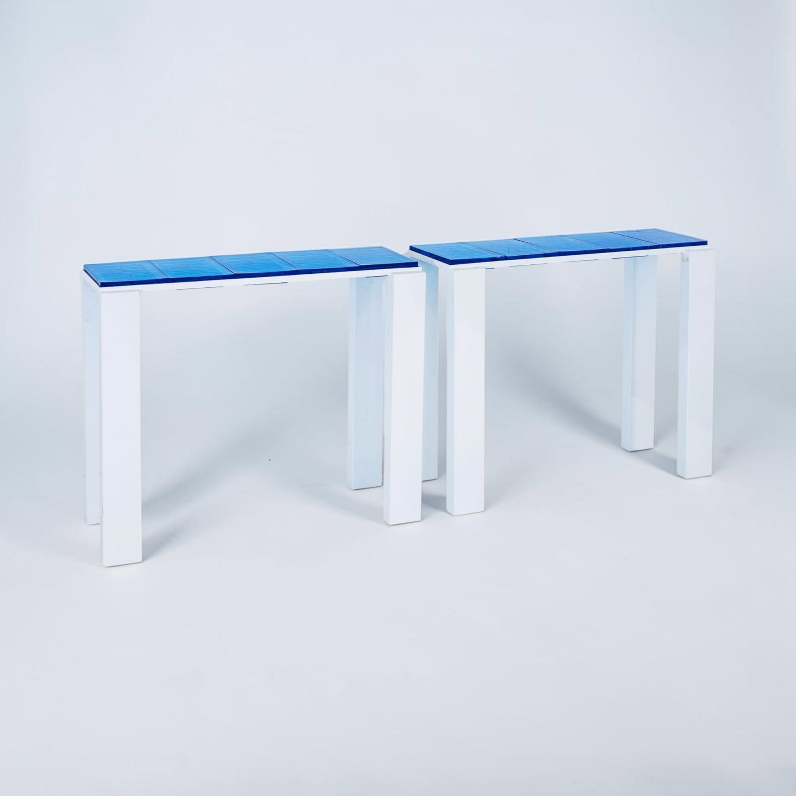 Roberto Giulio Rida (1943) Ching Pair of side tables Tinted glass and painted steel One-of-a-kind: Roberto Giulio Rida (1943)ChingPair of side tablesTinted glass and painted steelOne-of-a-kind pieceDate of creation: 2011H 84 W 91 D 35 cm.
