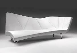 Karim Rashid Orikami Sofa Cream leather, neon green stitching, aluminum legs Limited edition of 8: Karim RashidOrikamiSofaCream leather, neon green stitching, aluminum legsLimited edition of 8 Gerard van den Berg, NetherlandsCreation date: 2004H118 W330 D165 cmA rare and striking Orikami sofa
