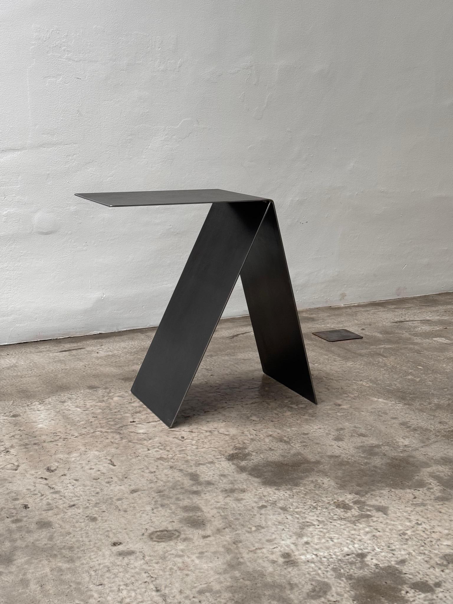 Hermann Becker (born in 1956) Tilting side table Steel Date of creation: circa 1980 H40 L30 P50 cm: Hermann Becker (born in 1956)Tilting side table Steel Date of creation: circa 1980H40 L30 P50 cm