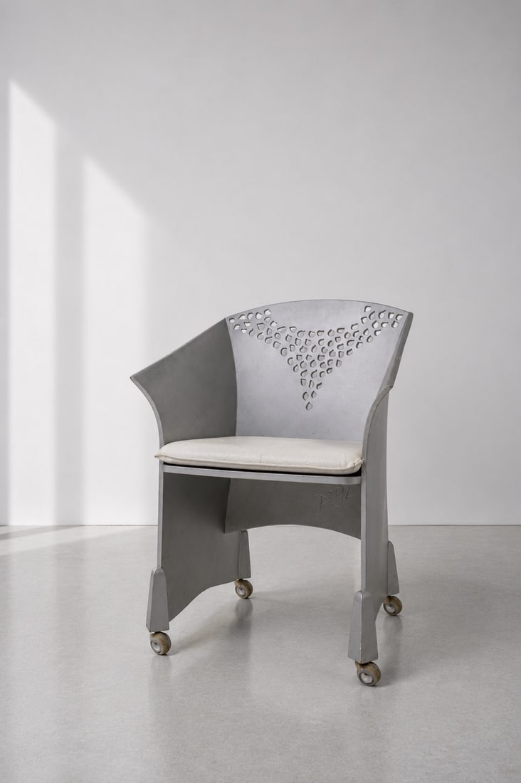 J.A. van ’t Leven (1948–2018) Armchair with removable casters Curved plywood, paint, white: J.A. van ’t Leven (1948–2018) Armchair with removable castersCurved plywood, paint, white leatherNetherlands, 1992Original design: 1985One-of-a-kind pieceH85 W60 D50 cmSigned and dated 1992.In goo