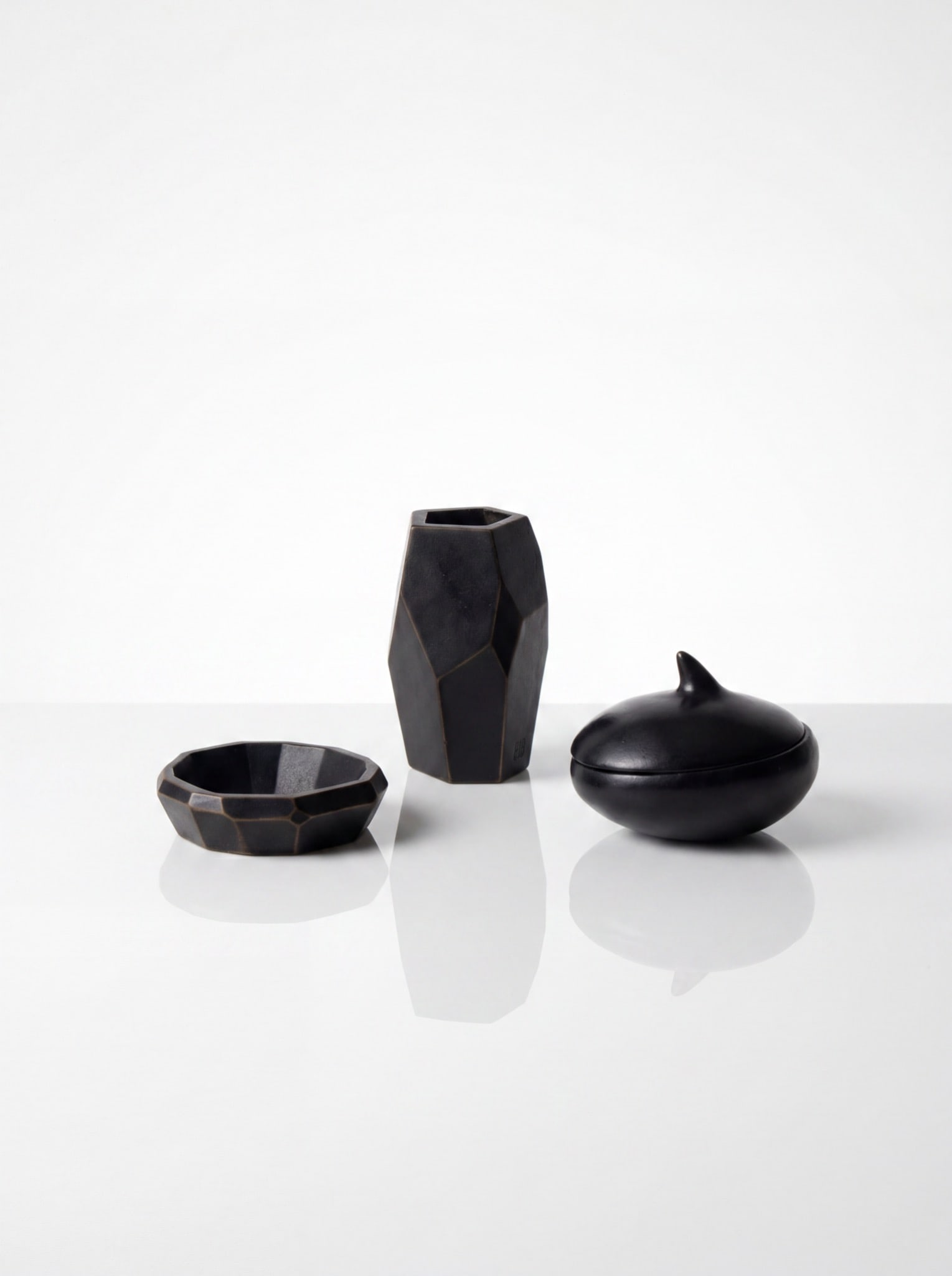 Elizabeth Garouste and Mattia Bonetti for Blome. Three-piece set consisting of a vase, a box, and a: Elizabeth Garouste and Mattia Bonetti for Blome.Three-piece set consisting of a vase, a box, and a trinket dishBlack-patinated bronzeCirca 1990In very good overall condition