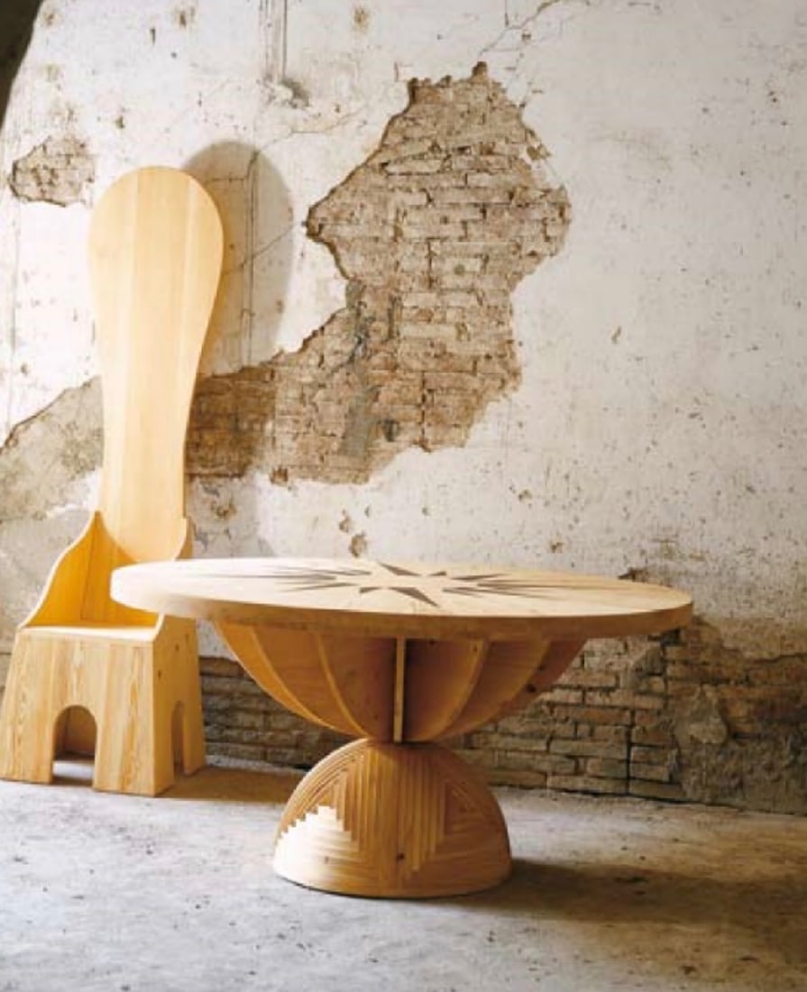 *Mario Ceroli (born in 1938) La Rosa dei Venti Table Pine and metal Poltronova Edition Brand-marked: *Mario Ceroli (born in 1938)La Rosa dei VentiTablePine and metalPoltronova EditionBrand-marked “CeroliPoltronova” on the baseDate of creation: 1973H75 D165 cmAdditional fees: reduced VAT rate 