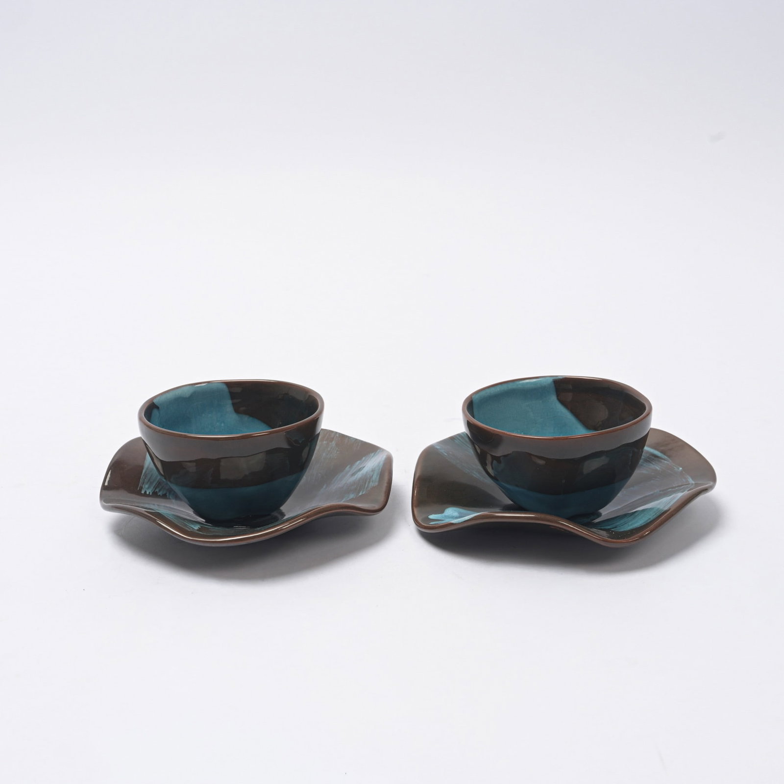 Claire de Lavallée (b. 1953) for Kenzo Apple Pair of cups and saucers Two-tone glazed ceramic (1 of 4)