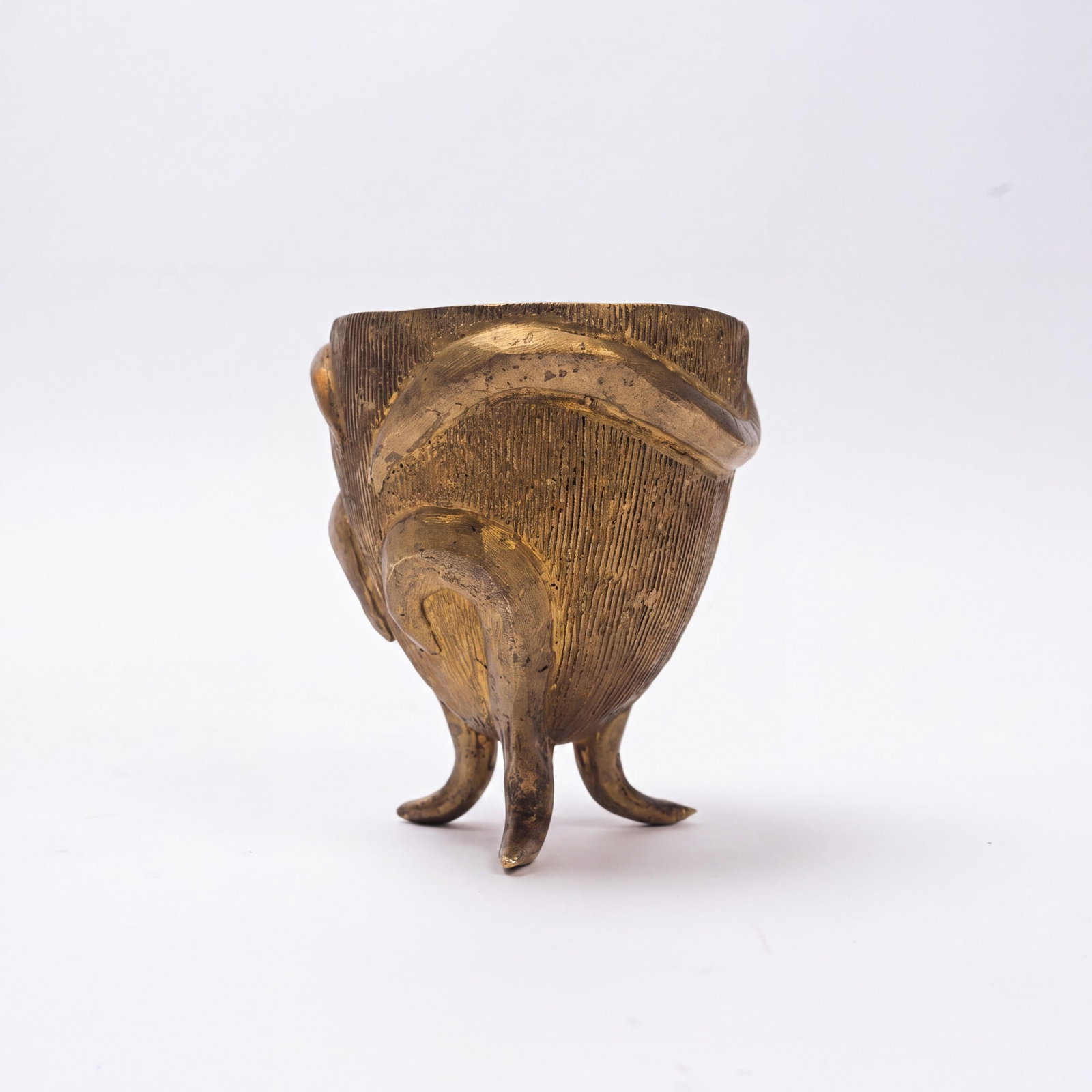Etni-Tecni Gilded bronze bowl Circa 1991 H 12.5, D 9.5 cm Excellent original condition: Etni-TecniGilded bronze bowlCirca 1991H 12.5, D 9.5 cmExcellent original conditionEtni-Tecni’s creations were distributed throughout the 1990s by prestigious retailers such as The Conran Shop and th