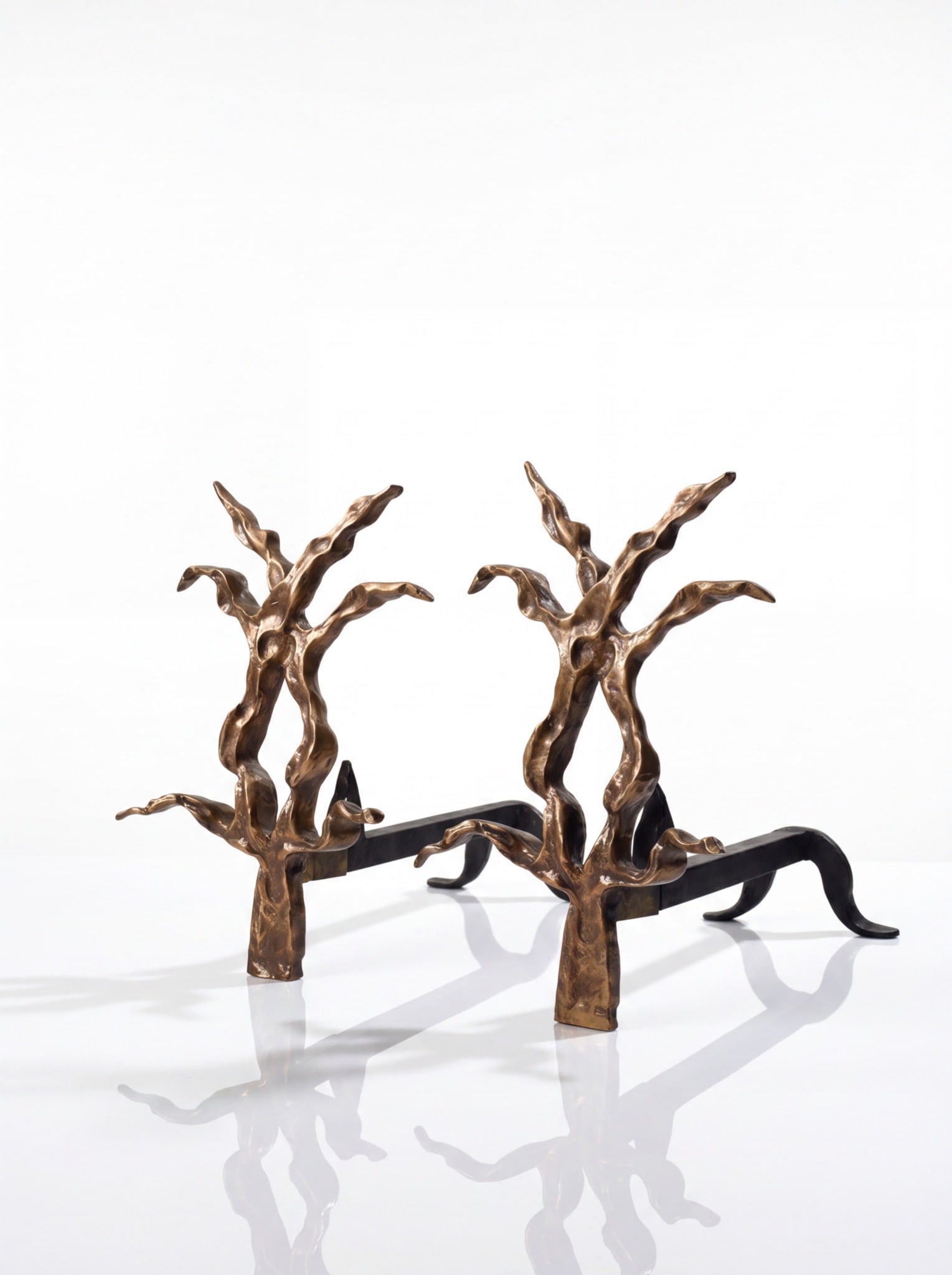 Gérard Dalmon (born in 1945) Pair of andirons Bronze and steel Produced by the Néotù Gallery Date: Gérard Dalmon (born in 1945)Pair of andironsBronze and steelProduced by the Néotù GalleryDate of creation: 1989H 30.5, W 33, D 19 cmIn very good overall conditionBy Gérard Dalmon for the Néotù G