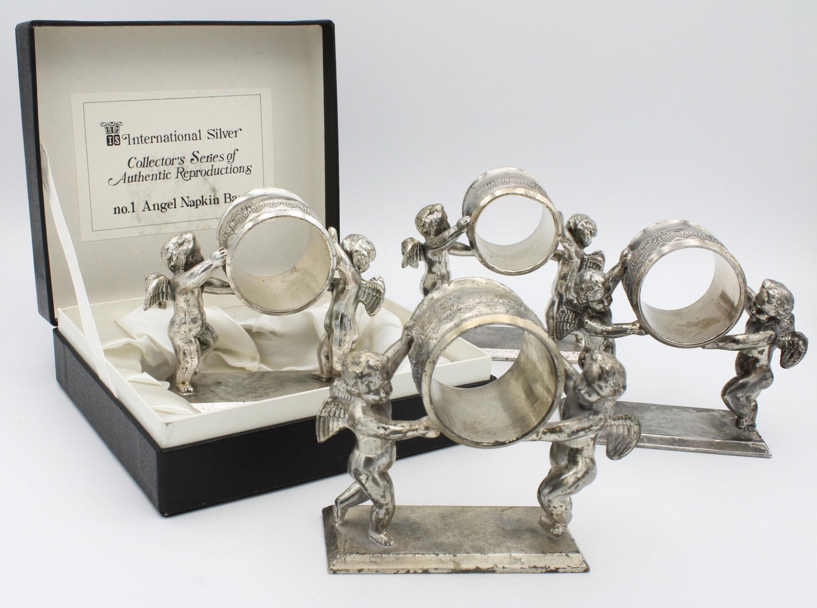 Set of Four VTG Silver Cherub Napkin Ring Holders (1 of 4)