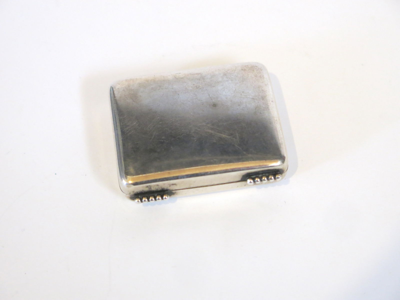 KALO Hand Wrought Sterling Silver Pill Box: Stamped Sterling on this repousse topped box. Lovely cut glass base.