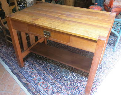 Mission Style Oak Writing/Library Desk: Quarter sawn oak is the highlight of this handsome library desk. Designed to sit out in a room, it's finished on all sides and with the mortise and tenon construction, there is nary a nail to be seen
