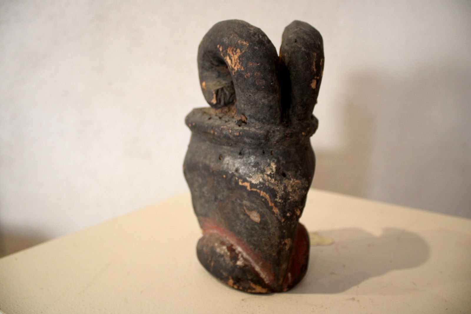 Ogoni Polychrome Ceremonial Goat Mask: Goat masks, or Je, represent wild, untamed, or powerful, sometimes symbolizing protective spirits or, in other contexts, reflecting the agricultural importance of animals. Worn on the top of the