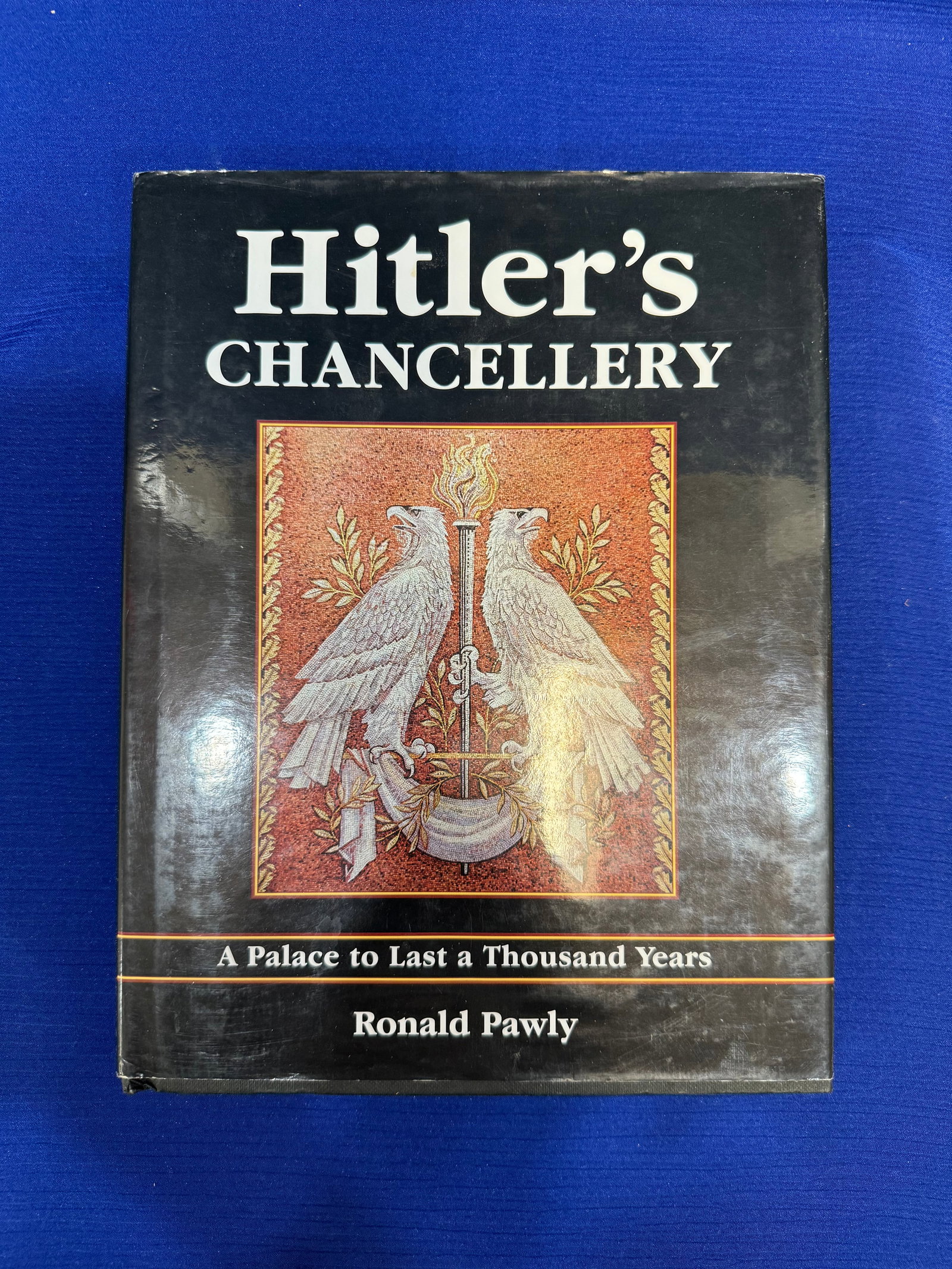 Book Titled "Hitler's Chancellery" by Ronald Pawly: This book tells the story of the most iconic building of the Third Reich. Hitler's New State Chancellery was designed by Albert Speer specifically to embody the power and arrogance of the new Nazi reg