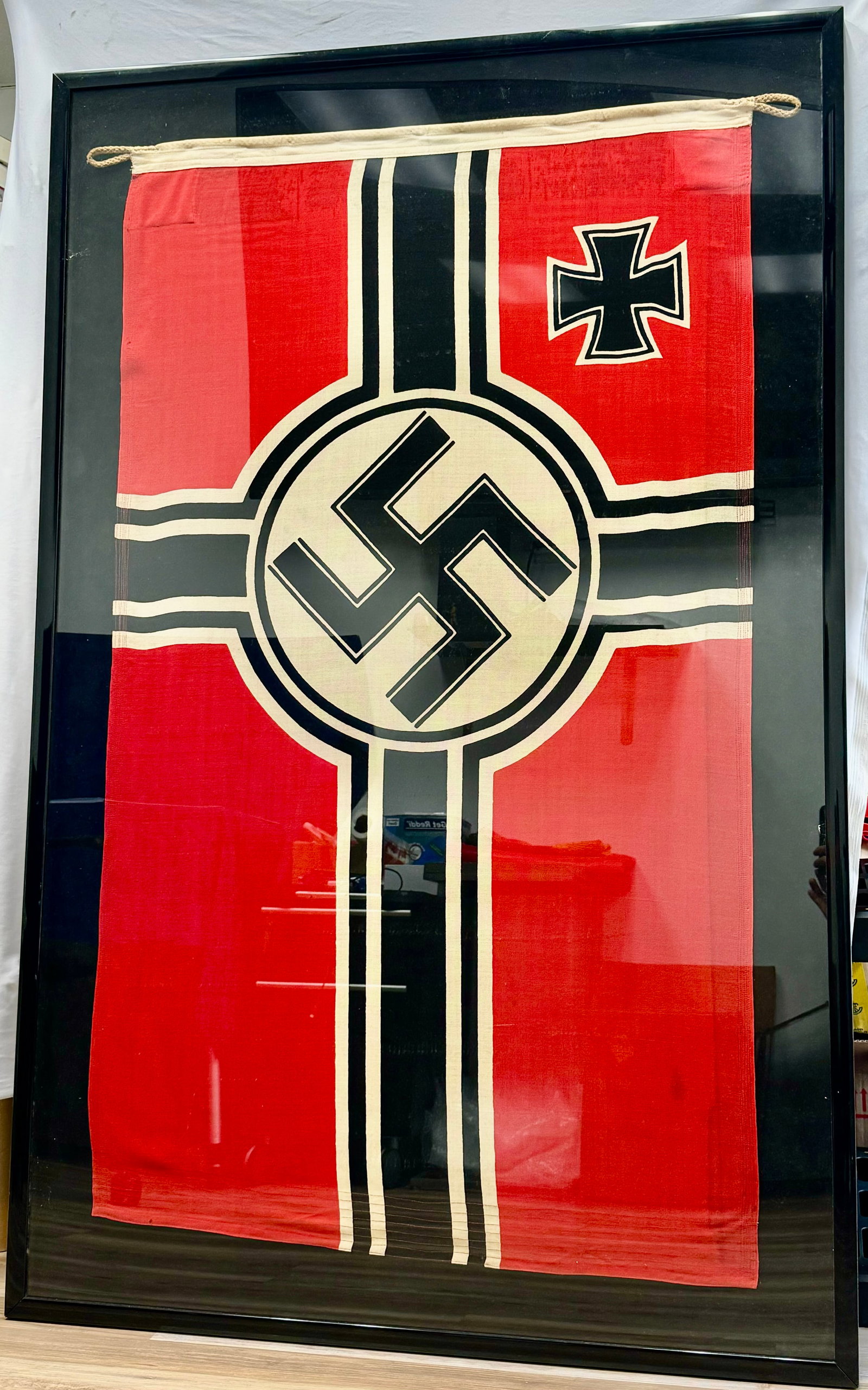 WW2 German Battle Flag in Frame: WW2 Battle Flag, Large size. Maybe KM Flag but have not taken in out of the frame. Flab is 31 x 52 inches. Add a few more inches for the frame. Professionally done. Excellent display item