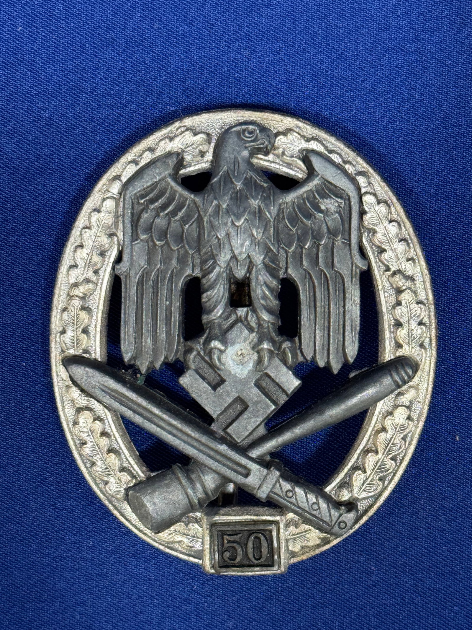 WW2 German 50 Engagement General Assault Badge – RK: 50 Engagement General Assault Badge – RK : Vet bring back from Maj Spaeth. He brought several awards back in New Condition. This is another example. The General Assault Badge (Allgemeines Sturmabzei