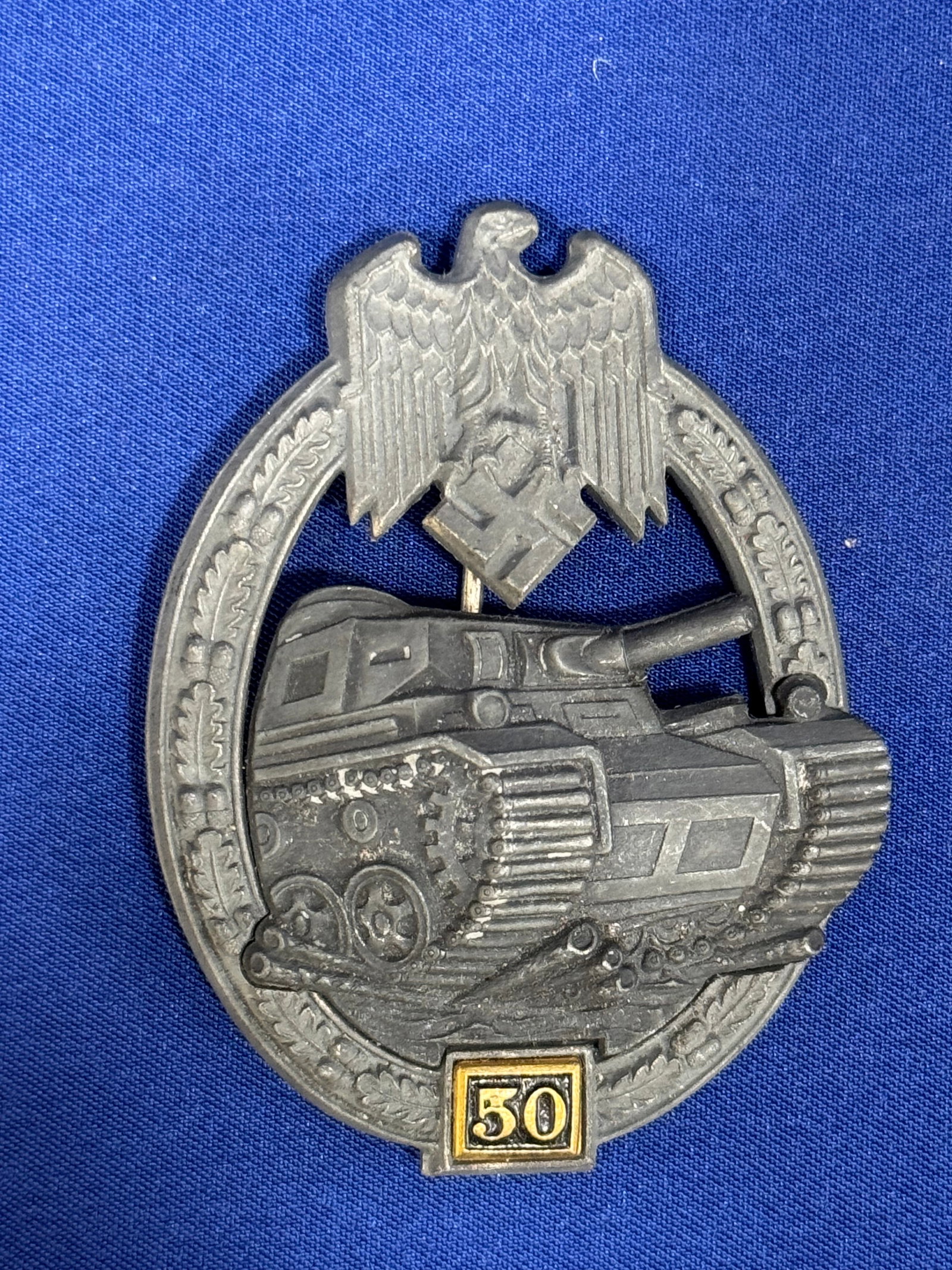 Original German WWII Special Grade 50 Action Bronze Panzer Assault Tank Badge by Gustav Brehmer of M: Original German WWII Special Grade 50 Action Bronze Panzer Assault Tank Badge by Gustav Brehmer of Markneukirchen : Another amazing award brought back from Maj Spaeth. Incredible estate. Still in New 