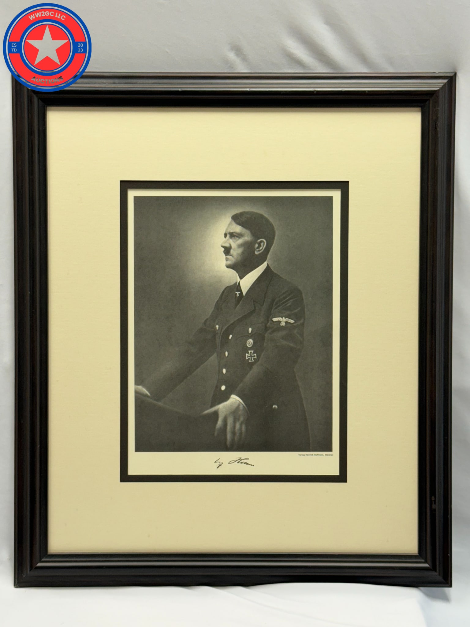 Adolf Hitler Portrait Photo by Heinrich Hoffmann: Adolf Hitler Portrait Photo by Heinrich Hoffmann. This is in a very nice frame that mesures 21 x 24 inches. Print is signed but we feel it is a facsimile signature.Heinrich Hoffmann (1885-1957) was a
