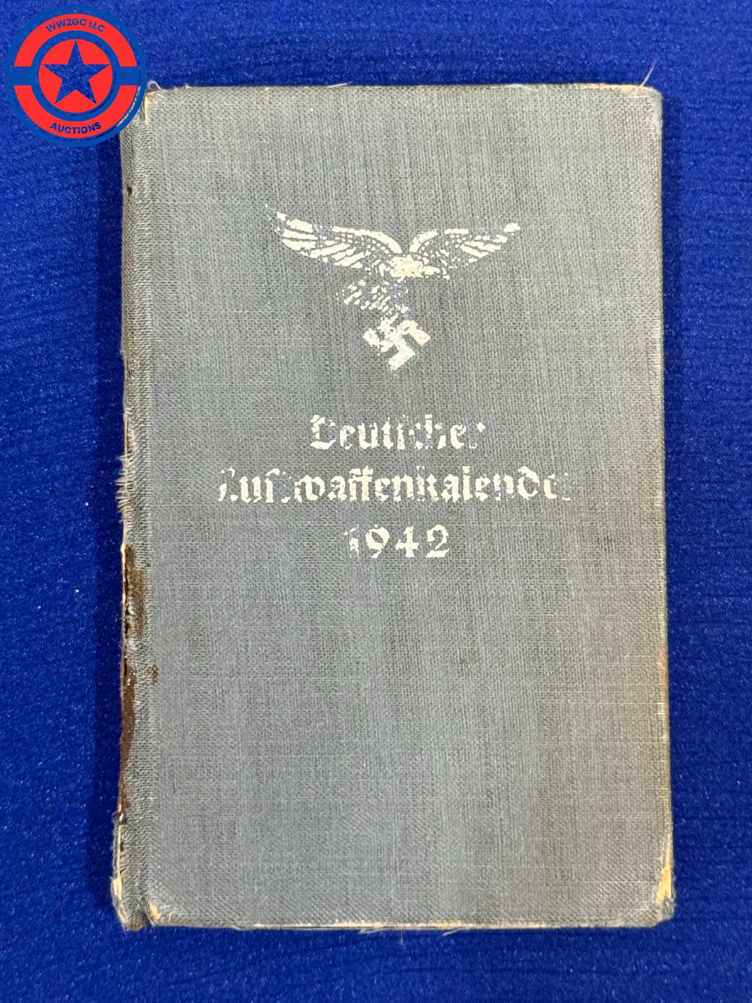 Bool - Luftwaffe “War Calendar 1942": pocket book for your average Airman. A really nice early eagle adorns the front, and inside all manner of things relating on becoming a better serviceman ? with aircraft recognition, ranks- flage arma